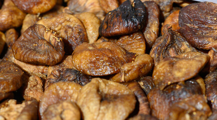Discovering the rich textures and flavors of dried figs in a vibrant marketplace