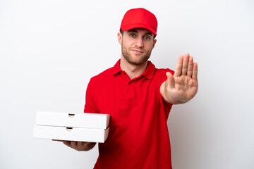 Pizza delivery caucasian man with work uniform picking up pizza boxes isolated on white background...