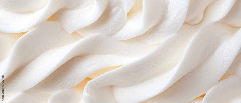 Poster close-up of a soft, creamy texture. the texture appears to be made up of multiple layers of whipped 