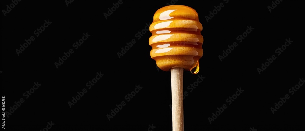 Poster close-up of a lollipop on a stick. the stick is made of wood and has a cylindrical shape with a poin