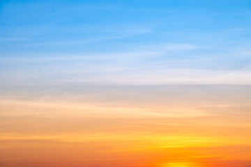 Sky,sunset, beautiful , luxury soft gradient orange gold clouds and sunlight on the blue sky perfect for the background, Sunrise on morning or everning in winter warm time ,Twilight summer,silhouette