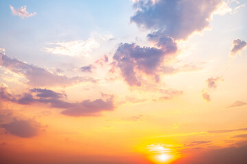 Sky,sunset, beautiful , luxury soft gradient orange gold clouds and sunlight on the blue sky perfect for the background, Sunrise on morning or evening in winter warm time ,Twilight summer,silhouette