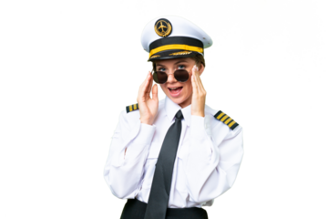 Airplane pilot woman over isolated chroma key background with glasses and surprised