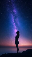Fototapeta premium Stargazer's Dream: A silhouette of a woman gazes upwards at the breathtaking beauty of a starlit sky, the Milky Way shimmering above her in a display of cosmic wonder.