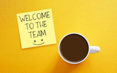 Welcome to the team is shown using the text and photo of cup