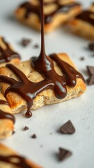 Chocolate drizzle on top of crispy wafer biscuit, crisp, chocolate