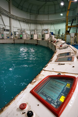 Obraz premium futuristic desalination facility featuring advanced control panels and circular water tank, showcasing technology and