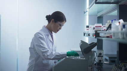 Fototapeta premium Asian female scientists are working in a biological laboratory