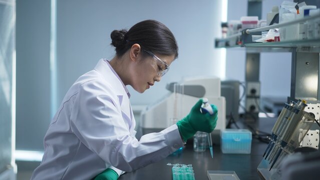Asian female scientists are working in a biological laboratory