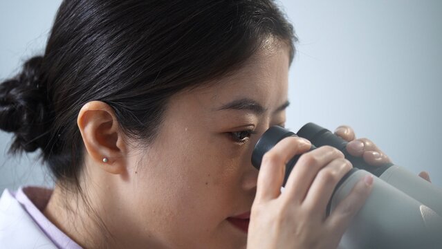 Asian female scientists are working in a biological laboratory