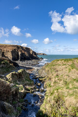 A stream running down to the sea, at Aberfelin Bay on the Pembrokeshire coast