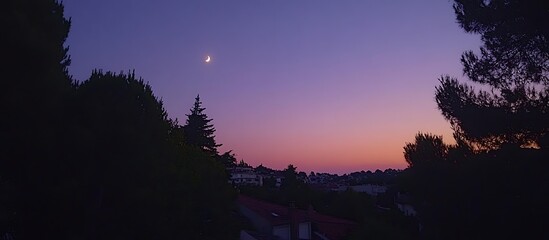 Twilight sky over suburban rooftops