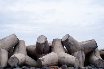 Bai da ong dia beach with tetrapods on the beach against the blue sky Mui Ne, Vietnam.