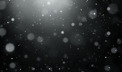 Abstract background with blurred particles in gray and white, creating a bokeh effect