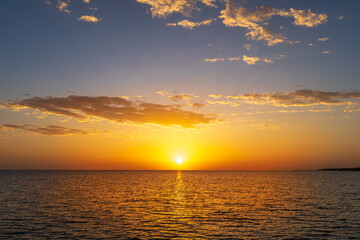Beautiful golden sunrise over the Red Sea in the summertime in Egypt