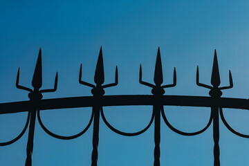 Ornamental Iron Fence Silhouette with Spiked Finials