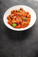 Eggplant stew dish vegetables salad tasty fresh delicious gourmet food background on table rustic food top view copy space keto and paleo diet vegetarian and vegan food
