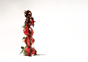melted chocolate on juicy strawberries on white background
