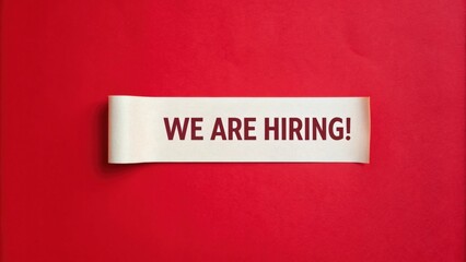 A bold "We Are Hiring!" message on a red background, signaling job opportunities.
