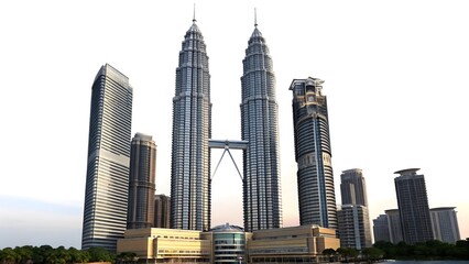 Naklejka premium Stunning View of Petronas Towers and Kuala Lumpur Skyline at Sunset - Iconic Architectural Marvels in Malaysia