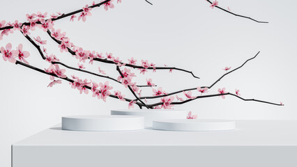 Three white podiums featuring intricate pink cherry blossom branches, perfect for showcasing products in a fresh, contemporary environment.