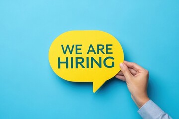 Colorful speech bubble with "We Are Hiring" text, symbolizing job opportunities and recruitment efforts.
