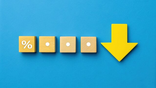 Colorful blocks with symbols and a downward arrow on a blue background, suggesting a decrease or drop.