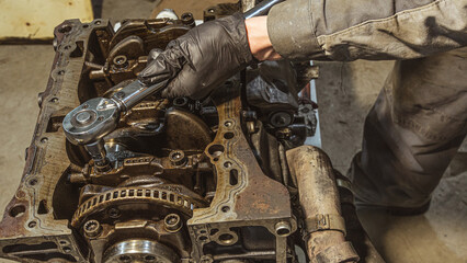 The concept of checking the readiness of the car before leaving.Auto mechanic working and repair on car engine in mechanics garage.Car service.Repairing engine in auto repair shop.Fix repair service