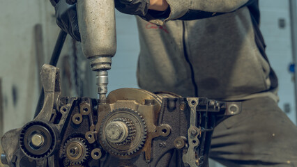 The concept of checking the readiness of the car before leaving.Auto mechanic working and repair on...