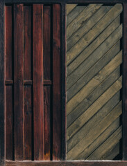 Two-Toned Wooden Door with Vertical Red Planks and Diagonal Greenish Boards
