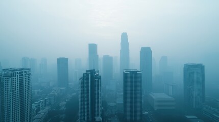 City skyline shrouded in fog creating a mysterious atmosphere.