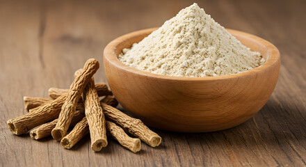 Wooden bowl containing shatavari powder with dried shatavari roots alongside, on a rustic wooden background.