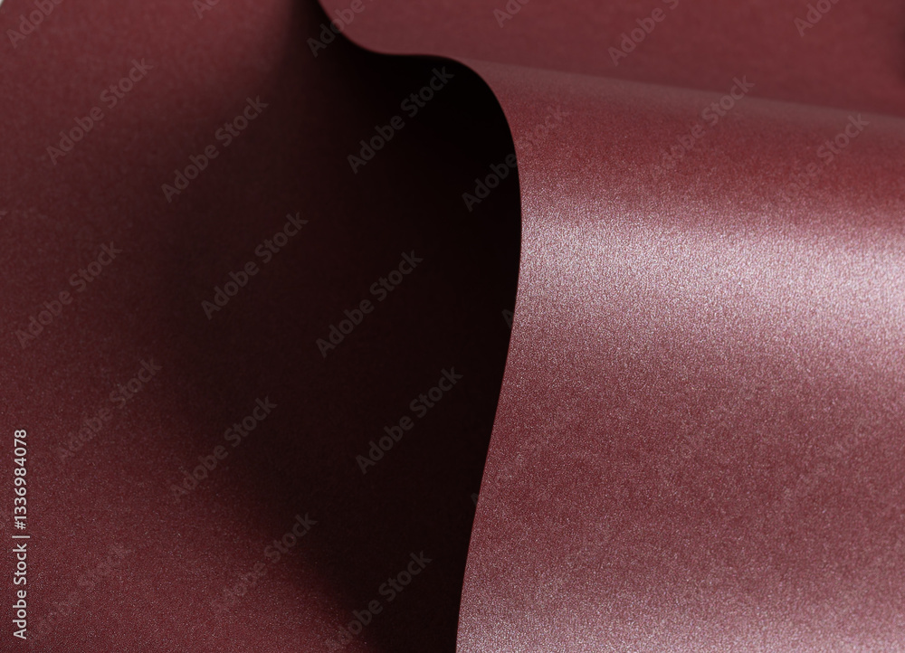 Poster elegant dark burgundy paper texture with a pearlescent shimmer and glossy finish. rich and reflectiv