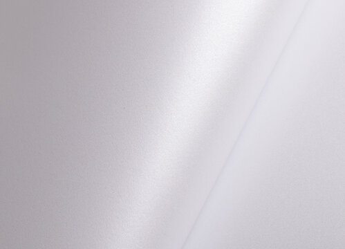 Elegant off-white paper texture with a pearlescent gloss and subtle shimmering effect. Rich and reflective designer material with a soft gradient, perfect for luxury stationery, artistic backdrops,.