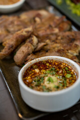 Grilled Pork Neck served on wooden plate