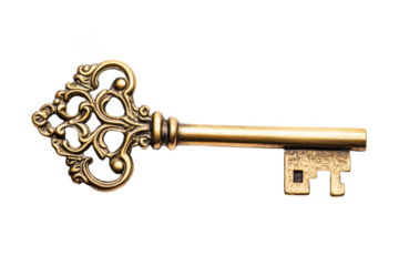 Close-up of antique brass skeleton key with ornate design and intricate metalwork isolated on white background