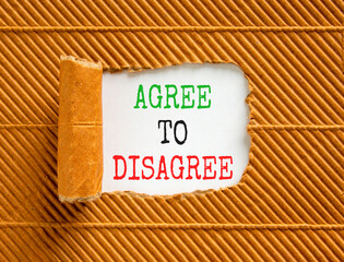 Agree to disagree symbol. Concept words Agree to disagree on beautiful white paper. Beautiful brown...