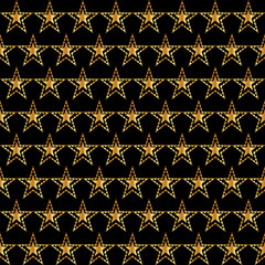 A repeating pattern of golden stars on a black background creates a striking visual effect.