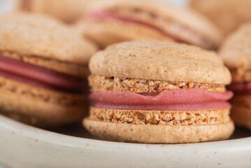 Vegan homemade macaroons, closeup. Healthy dessert. Sugar, lactose and gluten free.