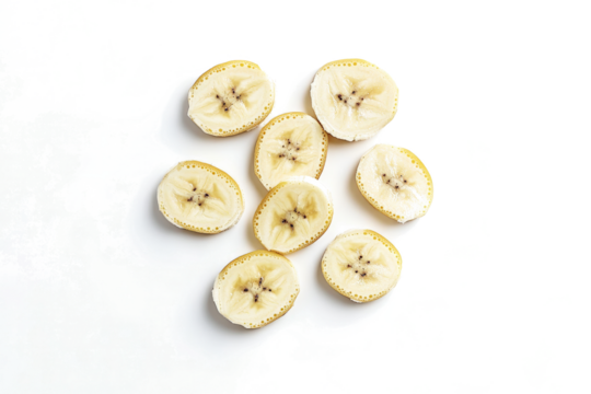 sliced bananas on a white surface cutout image and isolated on transparent background 