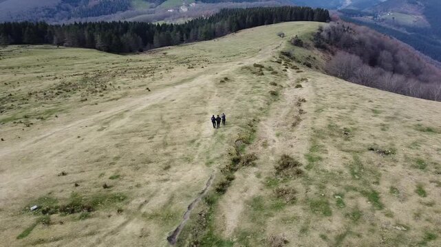 aerial view of hikers hiking in y&iexcl;the mountains of Urkiola Natural Park in the basque country