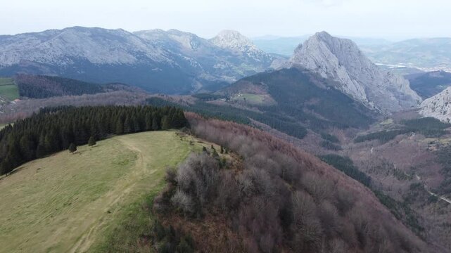 aerial view of hikers hiking in y&iexcl;the mountains of Urkiola Natural Park in the basque country
