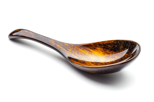 a wooden spoon with a brown and black pattern cutout image and isolated on transparent background 
