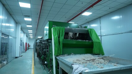 Carding machines in a woolen sweater factory