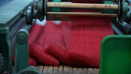 Carding machines in a woolen sweater factory