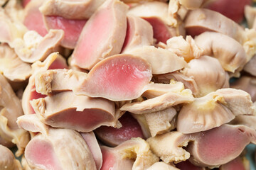 Fresh chicken gizzards on a monochrome background