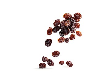 Fototapeta premium Falling Raisins – Dried Fruit in Motion Isolated on White Background