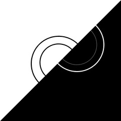 Abstract image with black and white halftones, consisting of two intersecting circles separated by a diagonal line. Contrast and minimalism create a dynamic visual effect.
