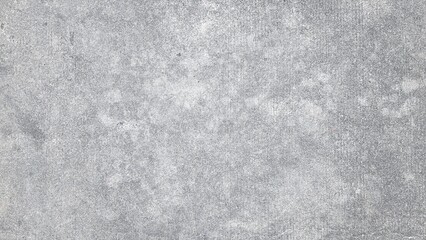 A concrete or cement floor is an outdoor patio or driveway. Gray cement floor with lines. Road, texture, background image.