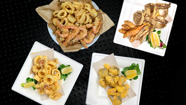frittura di mare mista servita in piatti differenti